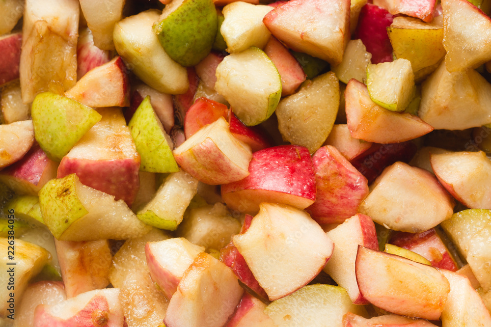 apple and pears pieces, sugar and syrup in pan, ready for boiling. Homemade red apple and pears jam, process of cooking apple and pears pieces, sugar and syrup in pan, ready for boiling. Homemade red apple and pears jam, process of cooking