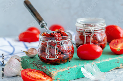 Jars with organic sun-dried tomatoes.