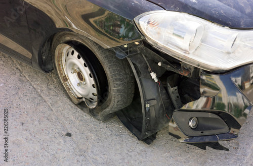 Accident on the road with damage to the car. knocked wheel. © Lumppini