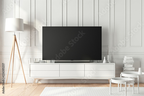 Large modern Smart Tv Mockup on white consоle in beautiful living room
