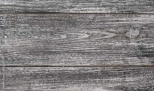 Gray wooden plank table background or texture.