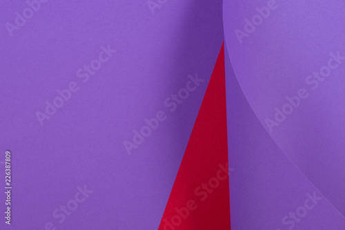 Abstract colorful background. Red violet purple color paper in geometric shapes