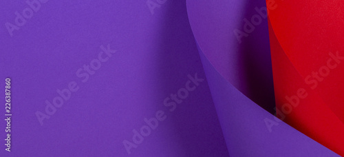 Abstract colorful background. Red violet purple color paper in geometric shapes