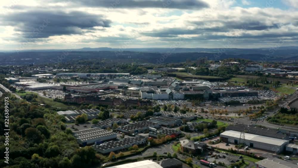 4K HDR Aerial view of an industrial estate and shopping complex in Dudley, West Midlands. 4K HDR Aerial view of an industrial estate and shopping complex in Dudley, West Midlands.