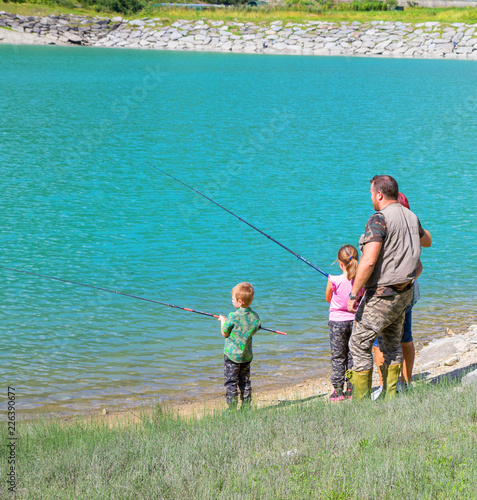 happy family fishing together 