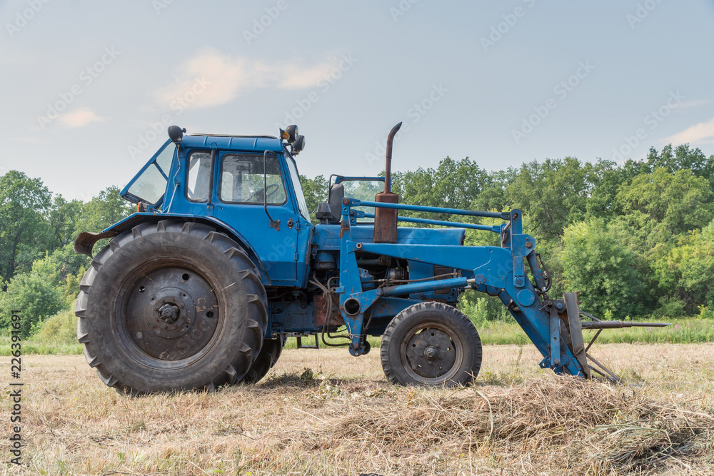 Tractor for working in the field and mowing grass. Agricultural machinery Tractor for working in the field and mowing grass. Agricultural machinery
