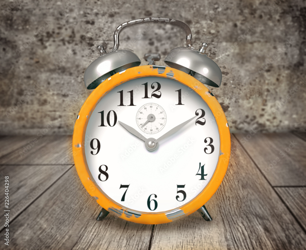 Retro alarm clock on wooden table Retro alarm clock on wooden table