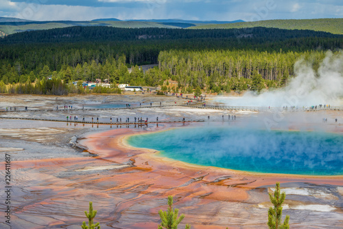 Tourists view Grand Prismatic Spring from the boardwalk