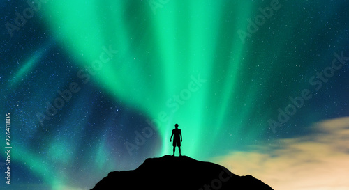 Aurora and silhouette of al...