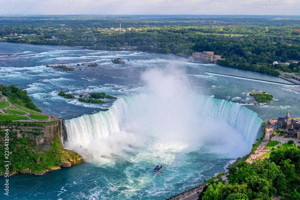 Horseshoe Falls aerial view with mist from Niagara Falls. Canada, USA.
