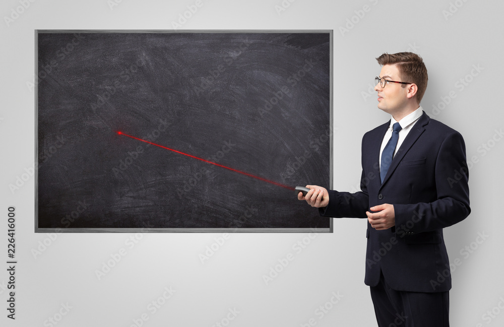 Handsome young teacher with laser pointer teaching
Handsome young teacher with laser pointer teaching