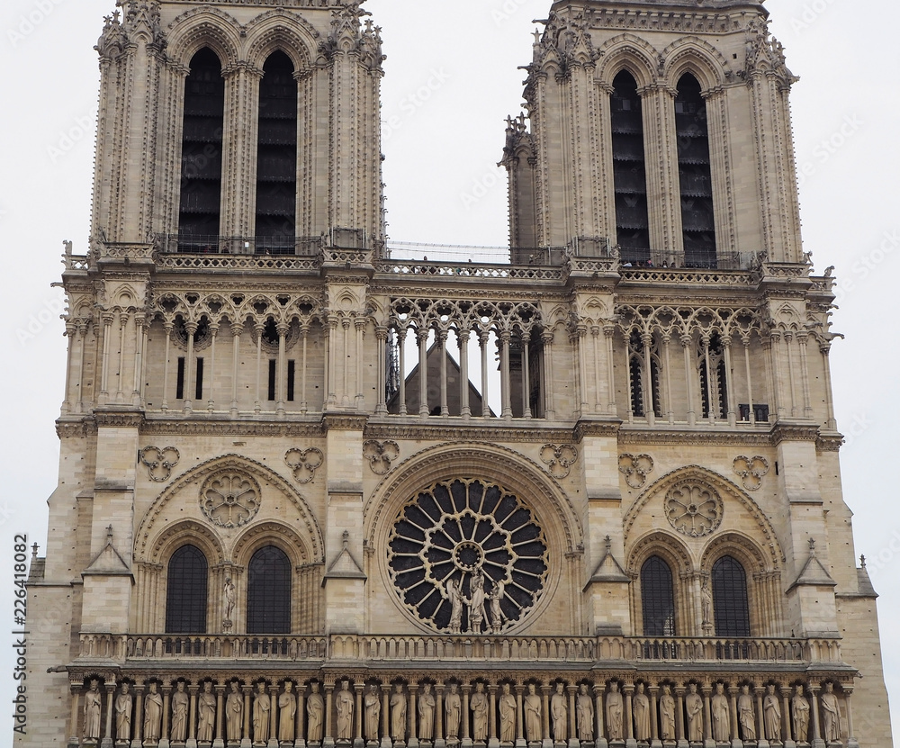 Notre Dame Cathedral - catholic church in the center of the city, one of the symbols of the French capital. Paris. France. Notre Dame Cathedral - catholic church in the center of the city, one of the symbols of the French capital. Paris. France.