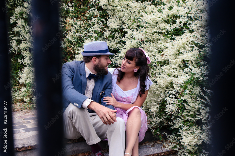 Couple sitting in the stairs of Montmartre in love