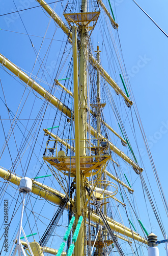 Old Russian sailing ship with old deck superstructures under bright sun