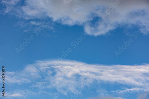 Fototapeta Naklejka Na Ścianę i Meble -  blue sky with white wispy clouds background