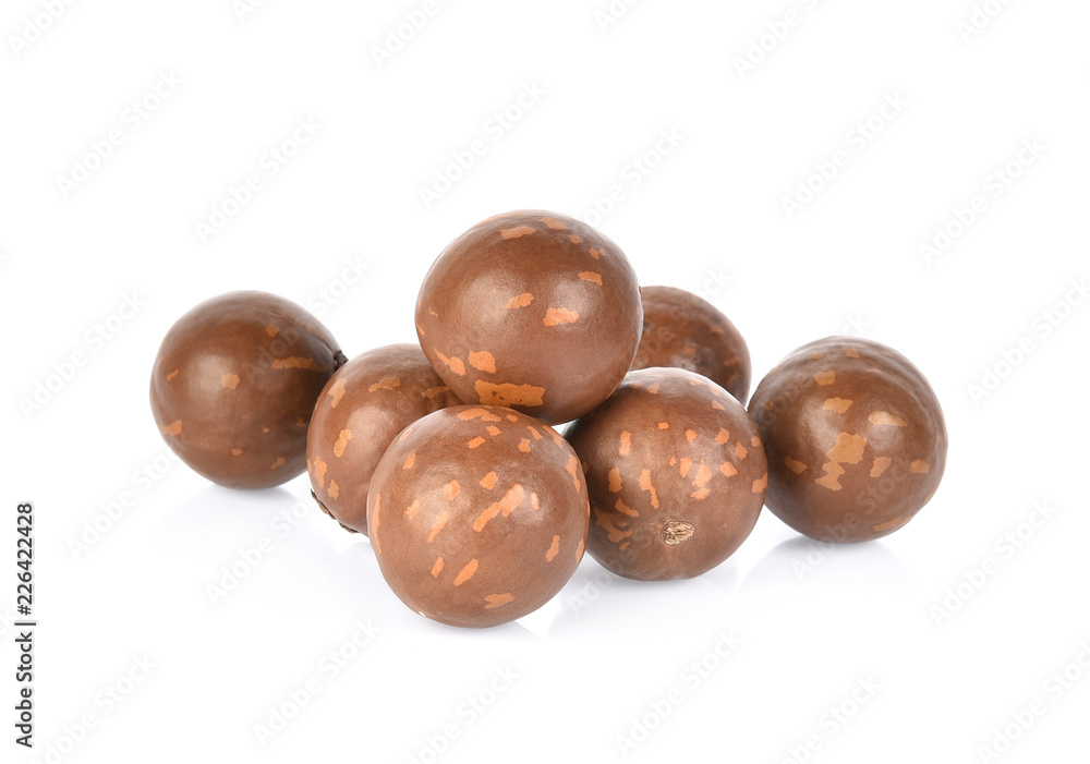 Obraz premium macadamia nuts on white background