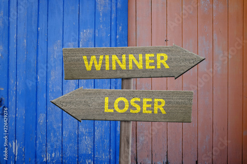 Winner and loser arrow signs competition concept