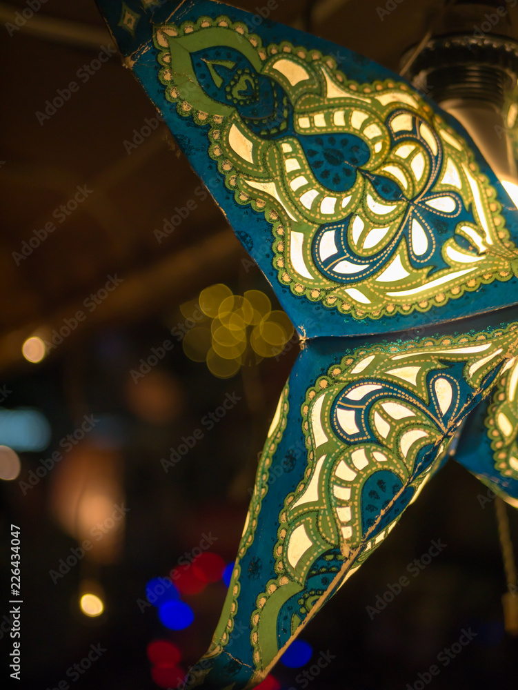 Naklejka premium Star Lantern shining up on a street of Tokyo, Japan.