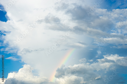 Blue sky and white cloud with rainbow © artpritsadee