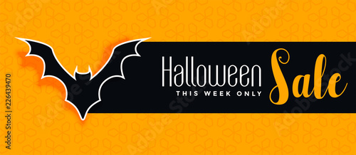 halloween sale yellow banner with bat silhouette