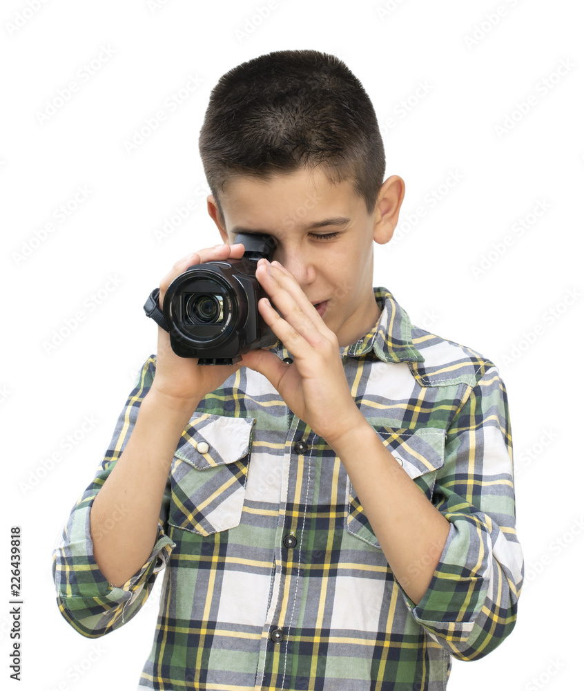 Boy hold video camera. White isolated Boy hold video camera. White isolated