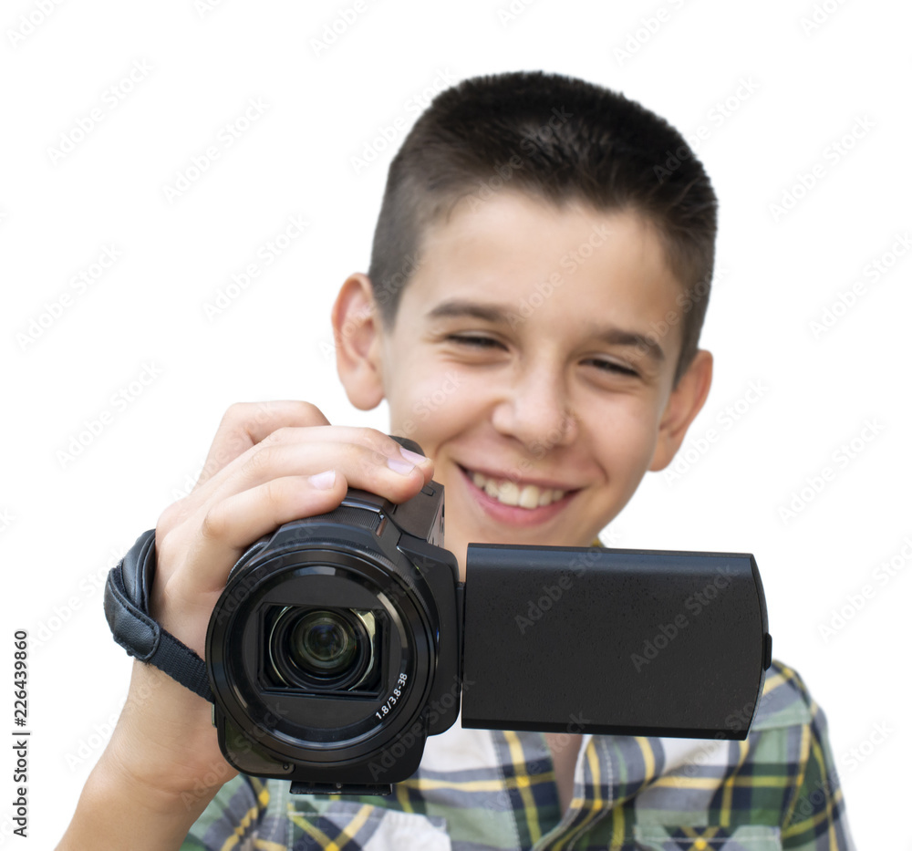 Boy hold video camera. White isolated Boy hold video camera. White isolated