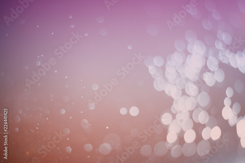 Blurred abstract bokeh light of fly water background, Christmas two tone colors.