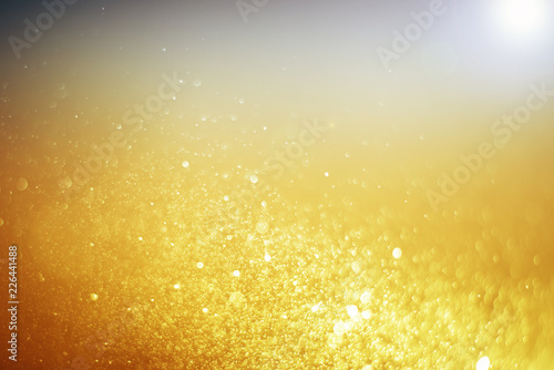 Blurred abstract bokeh light of fly water background, Christmas two tone colors.