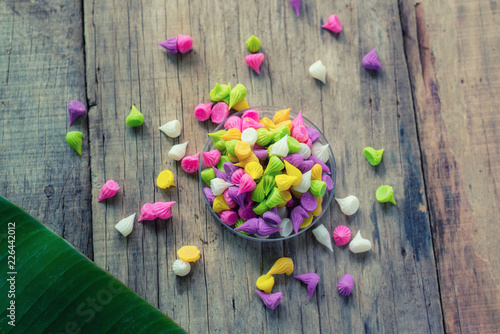 Thai colorful candy on wooden background