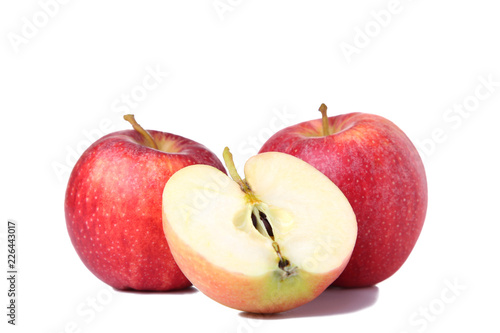 Fresh red apples isolated on white. Apple slice on white background