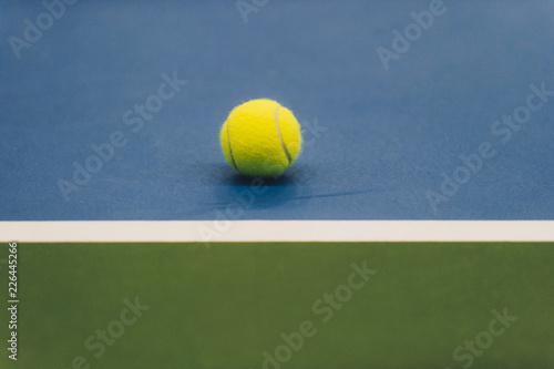 tennis ball on a tennis court © Augustas Cetkauskas