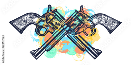 Crossed guns tattoo and t-shirt design. Wild west weapon watercolor splashes style. Crossed vintage revolvers handgun six shooter pistols