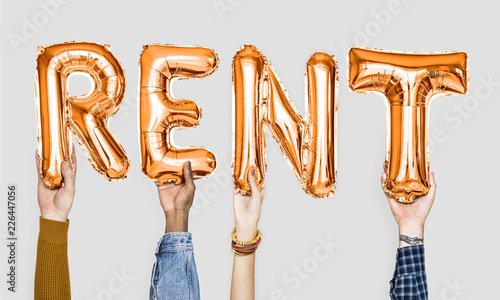 Orange alphabet balloons forming the word rent