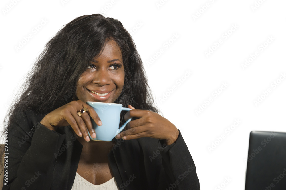 young happy and attractive black afro American business woman working at office computer desk smiling successful posing corporate drinking cup of coffee relaxed young happy and attractive black afro American business woman working at office computer desk smiling successful posing corporate drinking cup of coffee relaxed