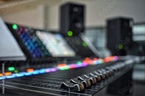 Audio controls in media control room.