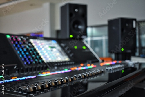 Audio controls in media control room.