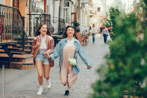 Beautiful ladys walking the street of the city.