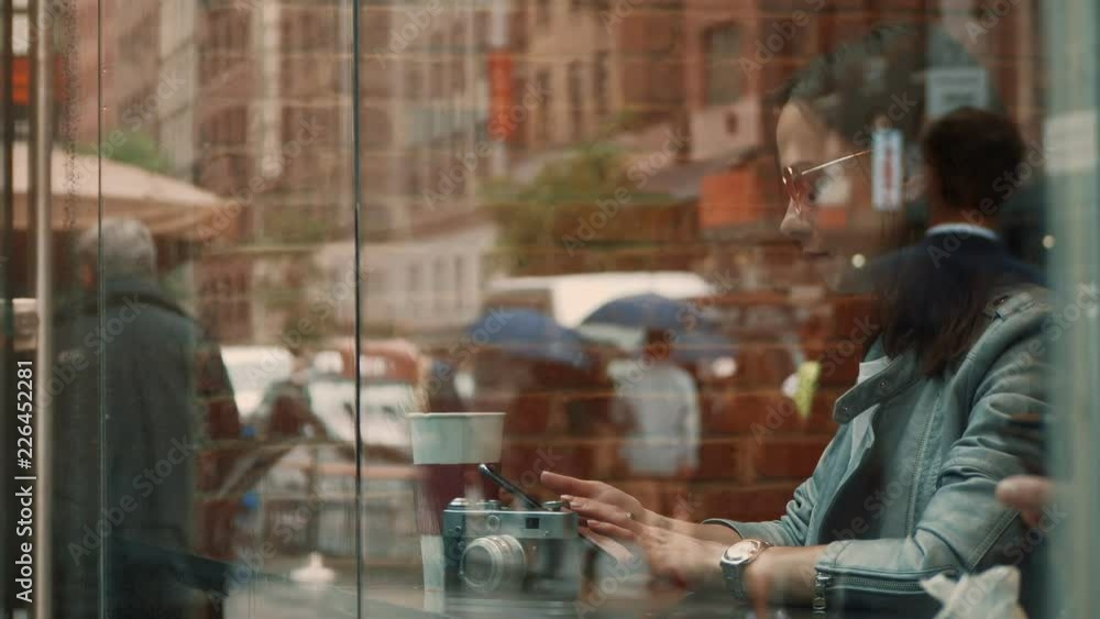 Attractive girl in a cafe in New York Attractive girl in a cafe in New York