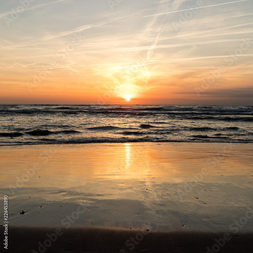 Scenic View Of Sea Against Orange Sky