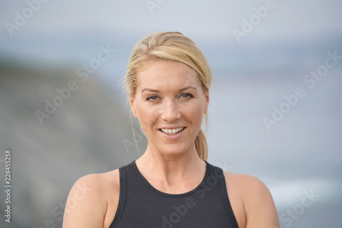 Portrait of athletic woman training outside