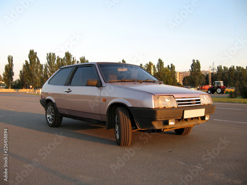 Принти на полотні Purple old car hatchback half turn view