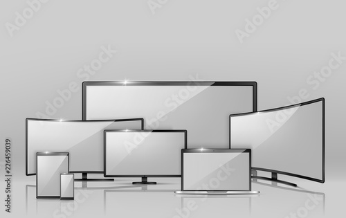 Vector 3d realistic collection of different screens - notebook, smartphone or tablet. Modern digital technology in size variations. Widescreen TV, empty LCD display isolated on grey background.