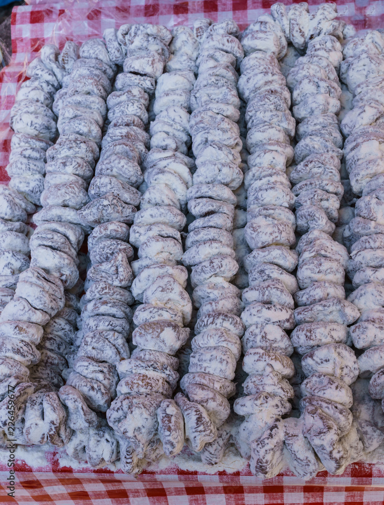 Dried brown figs on the rope on Montenegro's farm market. Dried brown figs on the rope on Montenegro's farm market.