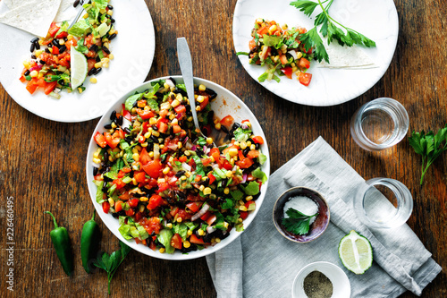 Mexican taco salad plate dark wooden table photo