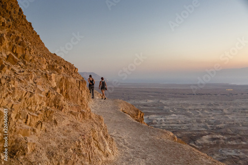 The snake path at sunrise leading up to Masada fortress at the edge of the Judean Desert, Israel.