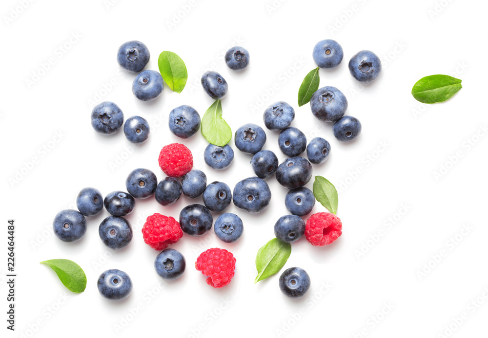 heap of ripe assorted berries isolated on white background heap of ripe assorted berries isolated on white background
