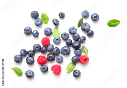 heap of ripe assorted berries isolated on white background