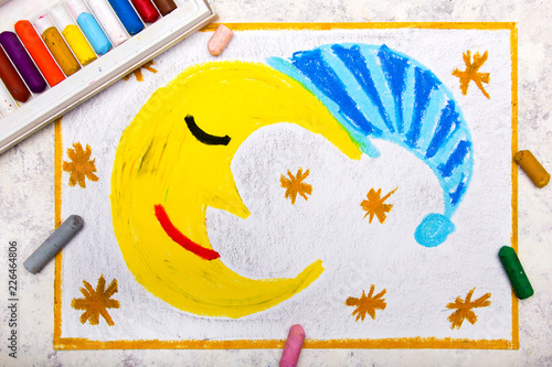 Colorful hand drawing: Cute sleeping moon in striped nightcap