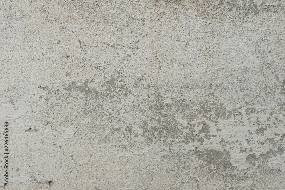 Wall fragment with scratches and cracks. It can be used as a background Wall fragment with scratches and cracks. It can be used as a background
