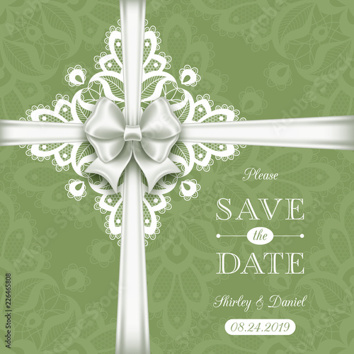 Wedding card or invitation template with a filigree lace pattern and white satin bow